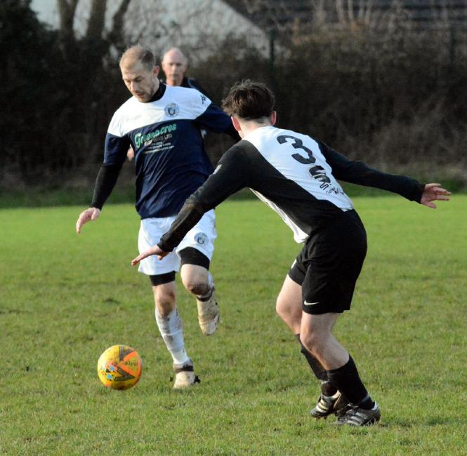 Karl Hedley presses forward for Fishguard Sports